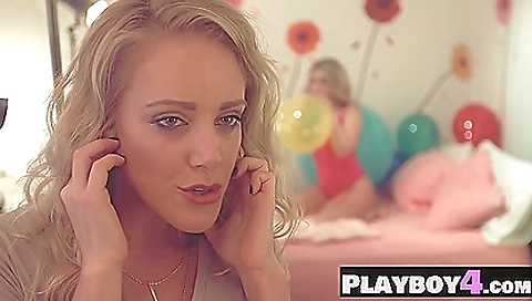 Two horny babes play with strapon