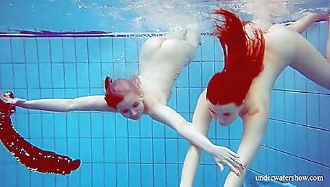 Mature lesbian orgy in the kitchen